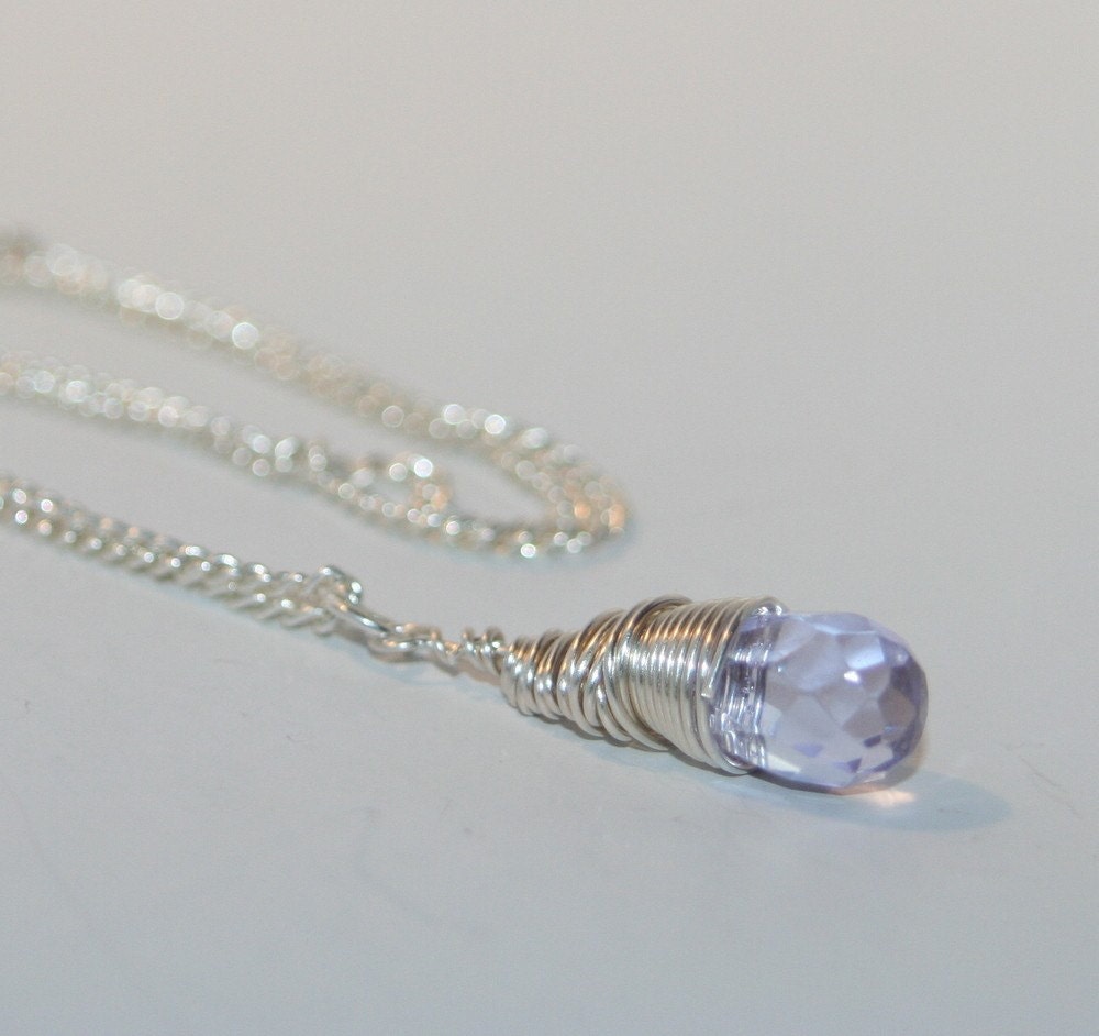 Hand wrapped fine silver and light pink faceted glass necklace