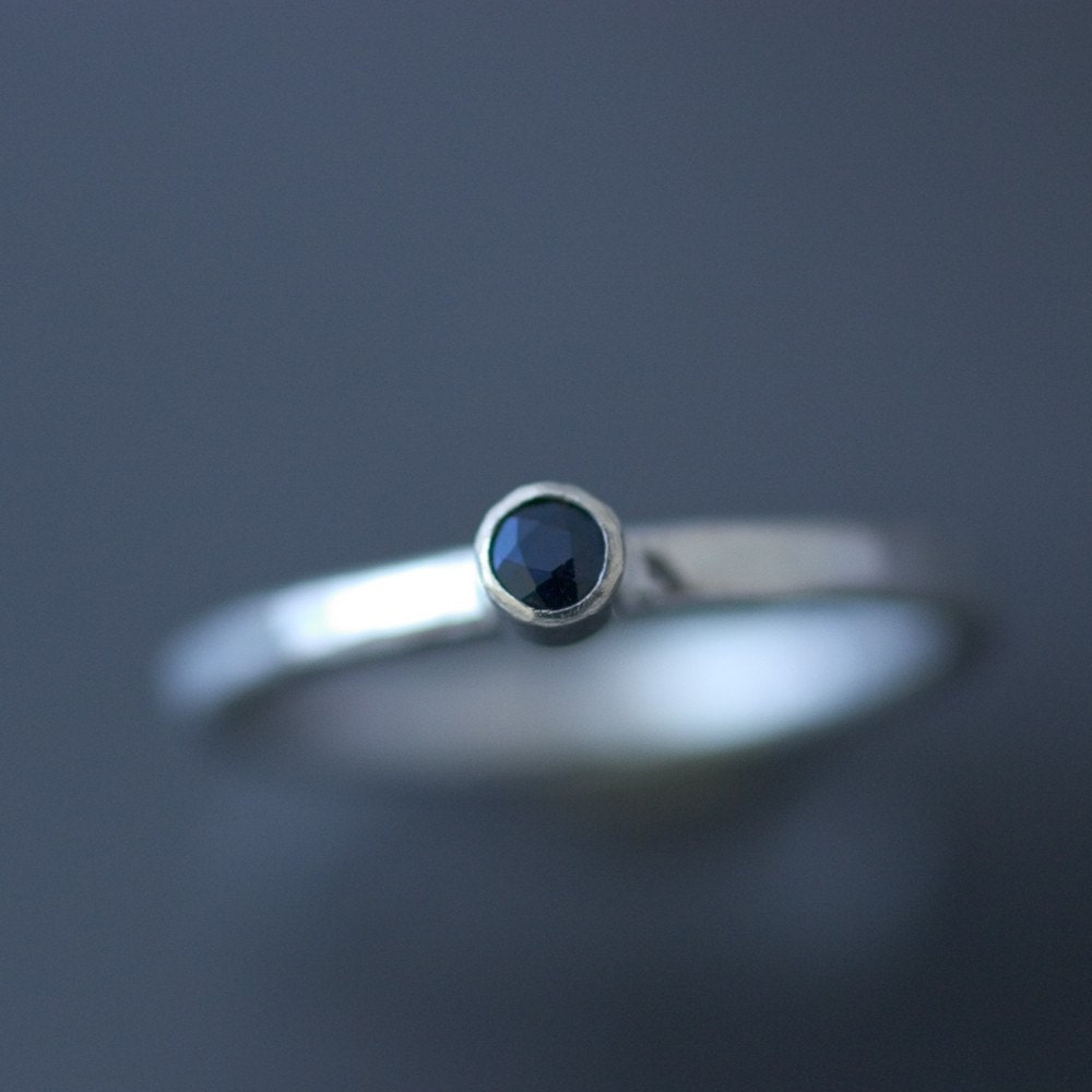 Hammered silver ring with sapphire