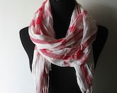 the picnic scarf in red and white.
