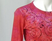 Curlicues Time's Echo Top in Fuchsia, Orange, and Red (extra large - large)