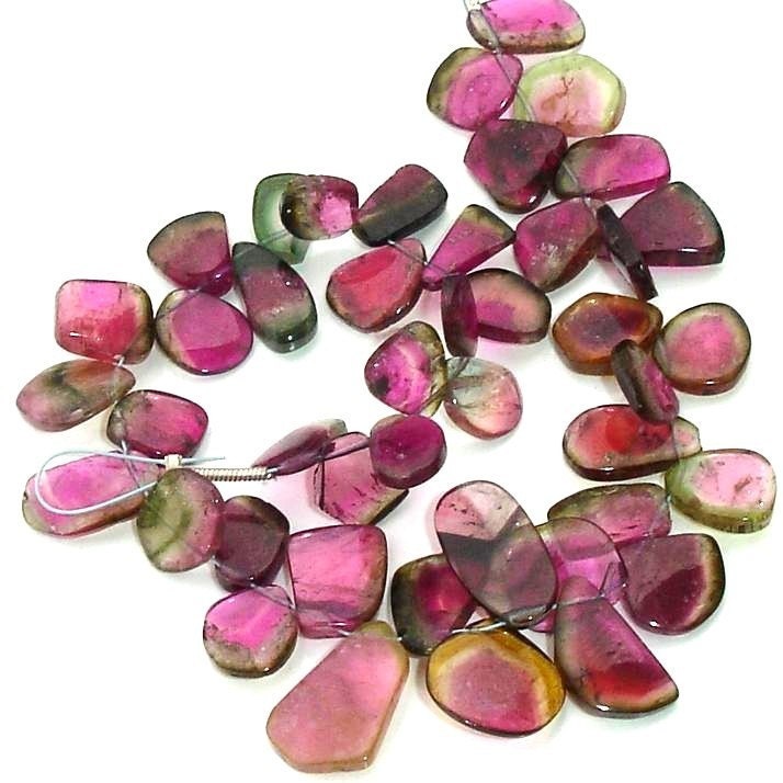 HALF STRAND TRULY RARE QUALITY ,WATERMELON TOURMALINE SMOOTH SLICES, UNIQUE ITEM AT LOW RATES,GREAT VALUE ITEM.