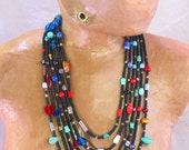Multi-strand Black Seed Beads with African Trade Bead Necklace