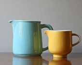 pair of vintage ceramic creamer pitcher yellow and teal