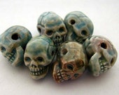 4 Raku skulls - tiny ceramic beads