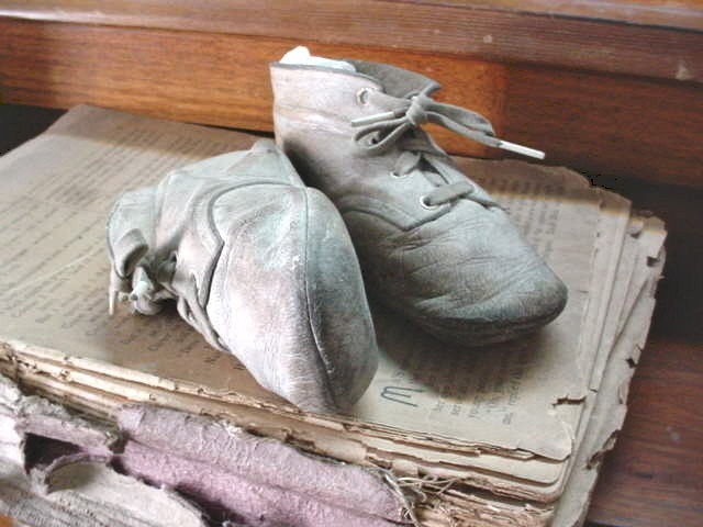 These Vintage Baby Shoes have seen some walkin. Bone gray leather the color of old antique paper