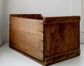 vintage 1950s wooden crate. rustic industrial.