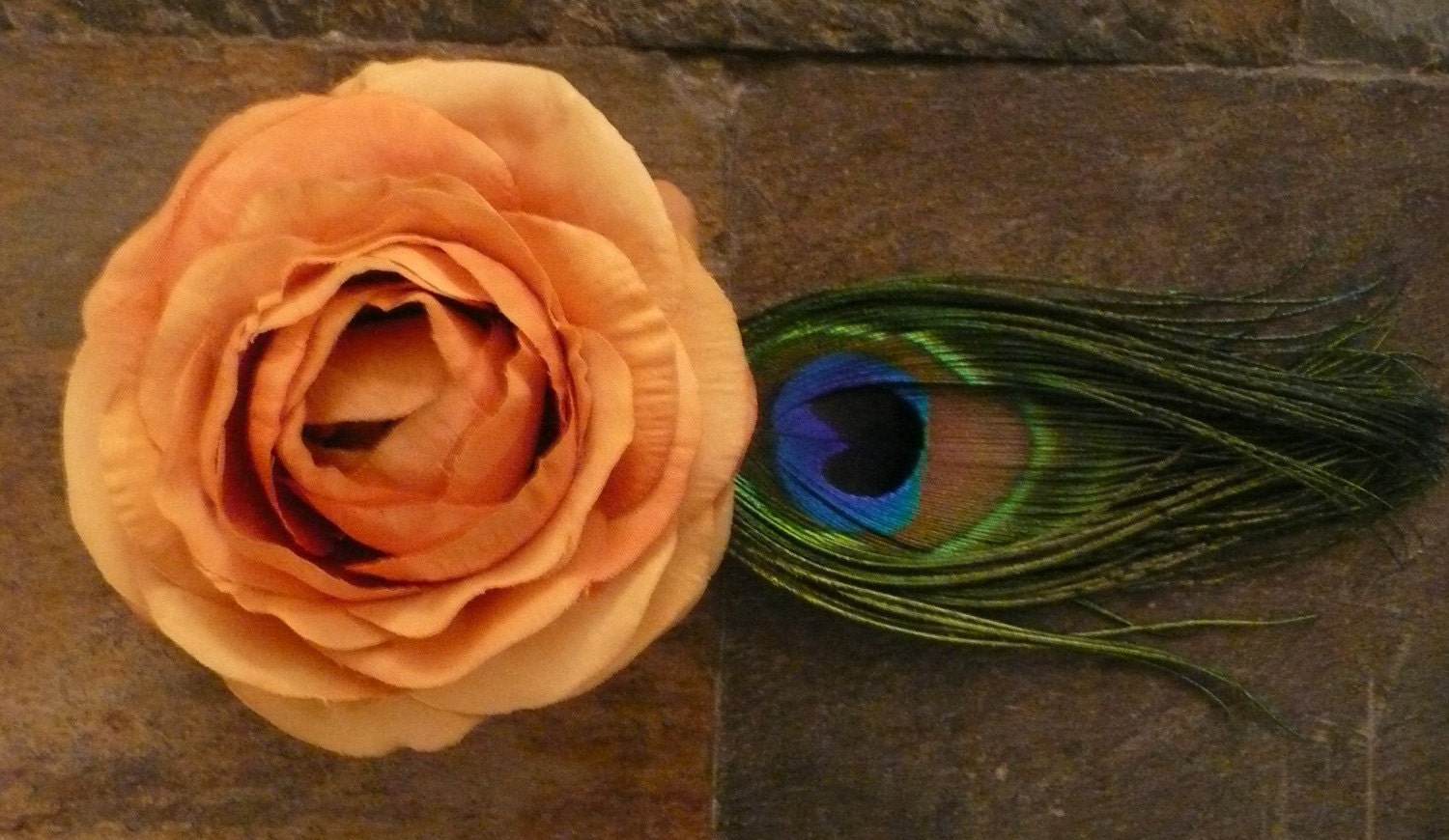 Monroe: Ranunculus with a Peacock Feather. In Purple or Cantaloupe. Free Worldwide Shipping