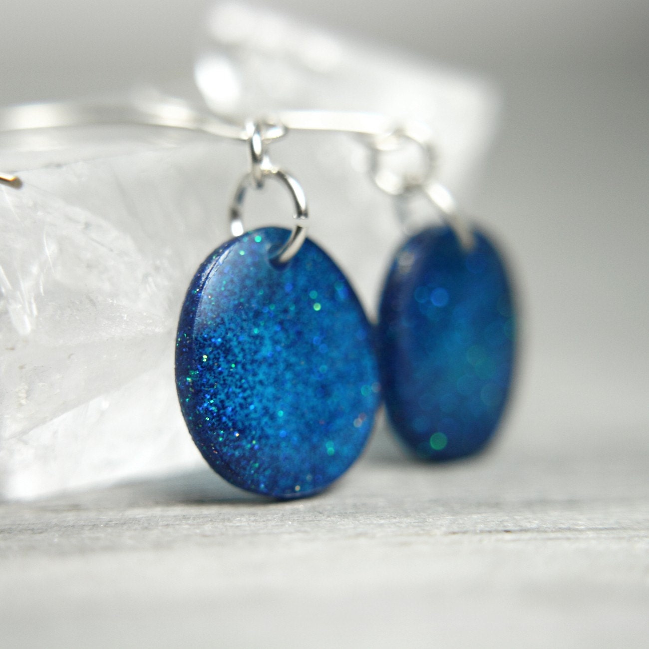 electric blue sparkly earrings on sterling silver