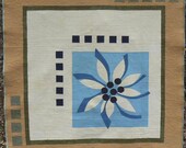 Quilt with a Blue Flower