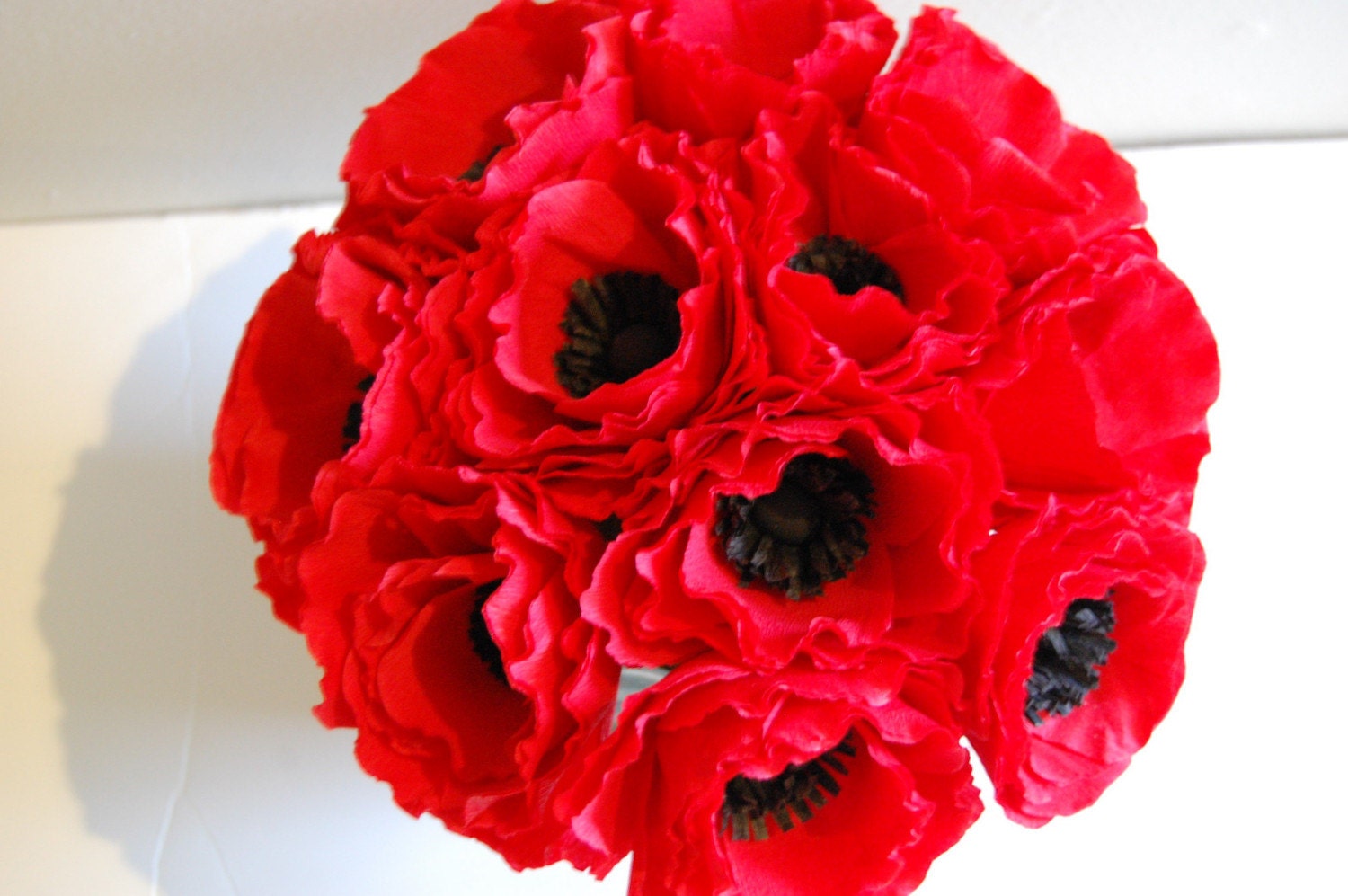Red anemone floral arrangement centerpiece