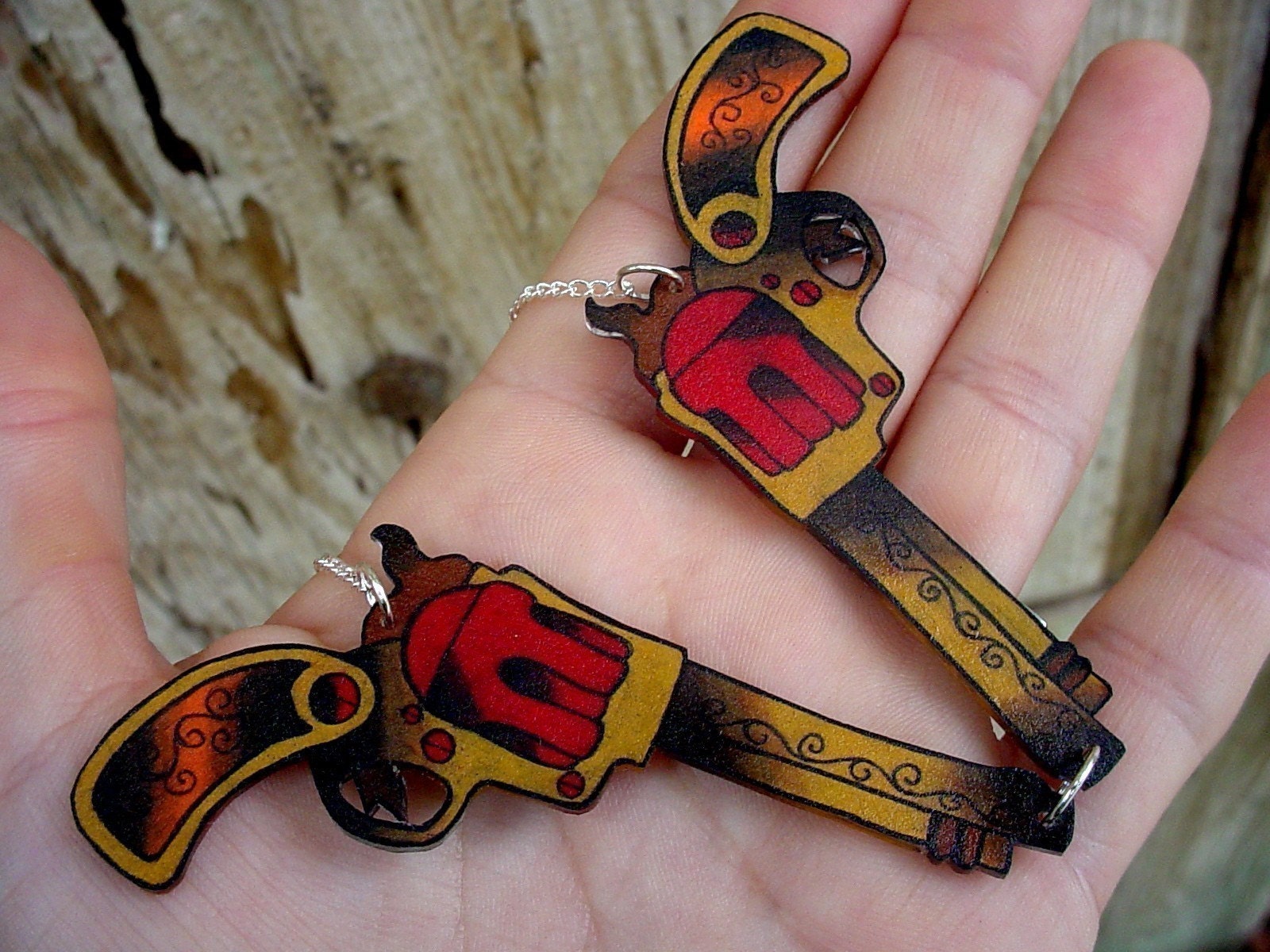 red gold and brown double vintage tattoo pistol necklace