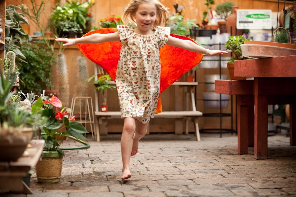 Butterfly dress with detachable butterfly wings, cream with orange and pink cape