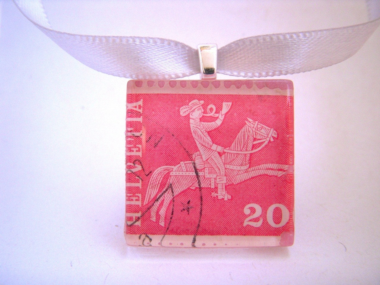 Vintage Swiss Postage Stamp Necklace. Helvetia Cowboy. Handcrafted by Juanitas on Etsy.