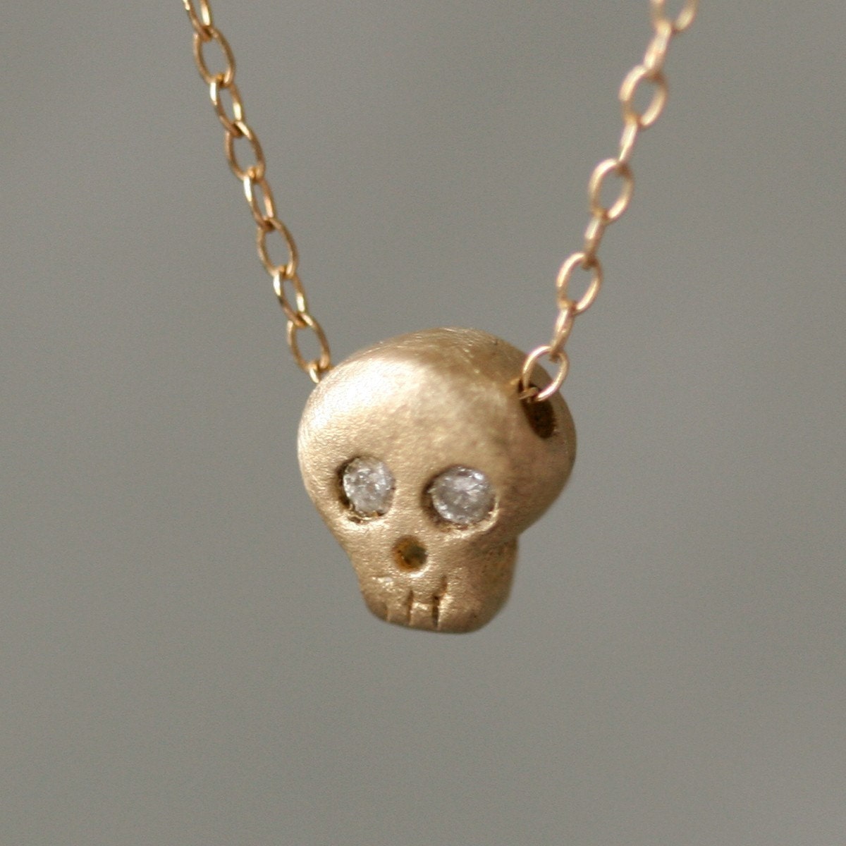 Baby Skull Necklace in 14K Yellow Gold with Diamonds