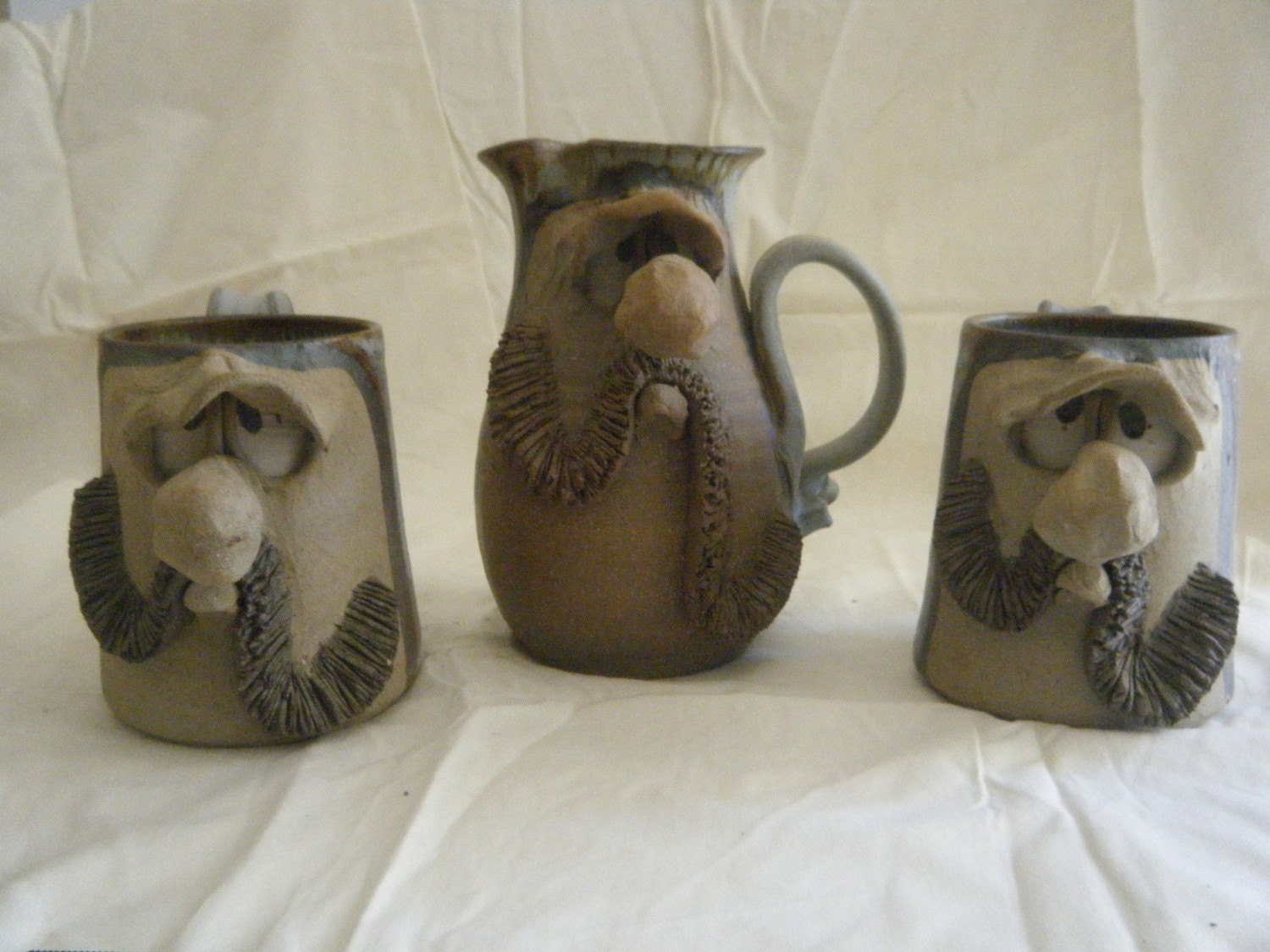 Big Nose Moustache Man Pottery Pitcher and Mugs