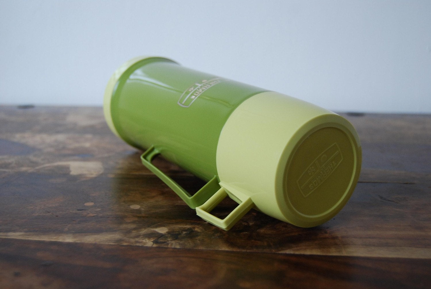 Vintage green and yellow Thermos flask
