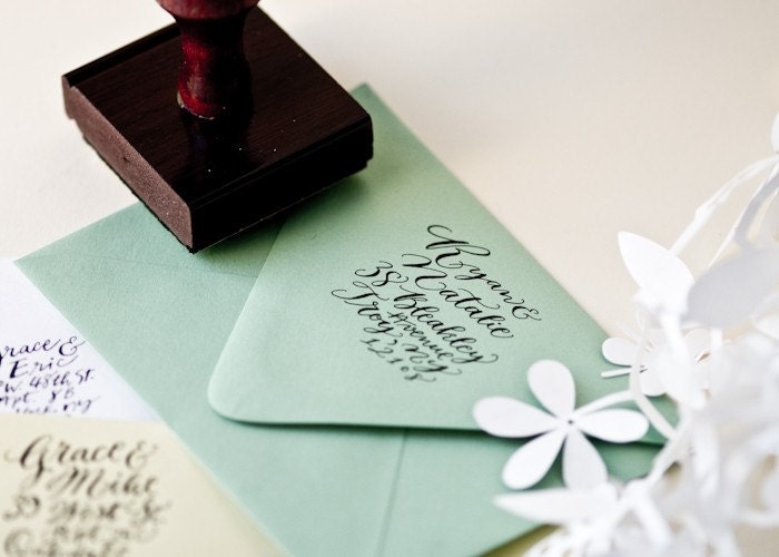 Featured via Martha Stewart Weddings these custom calligraphy rubber stamps