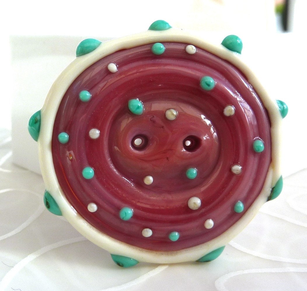 hamd crafted lampwork button