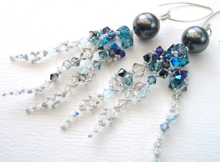Super-sparkly earrings like dangling icicles in blue, metallic and crystal shades