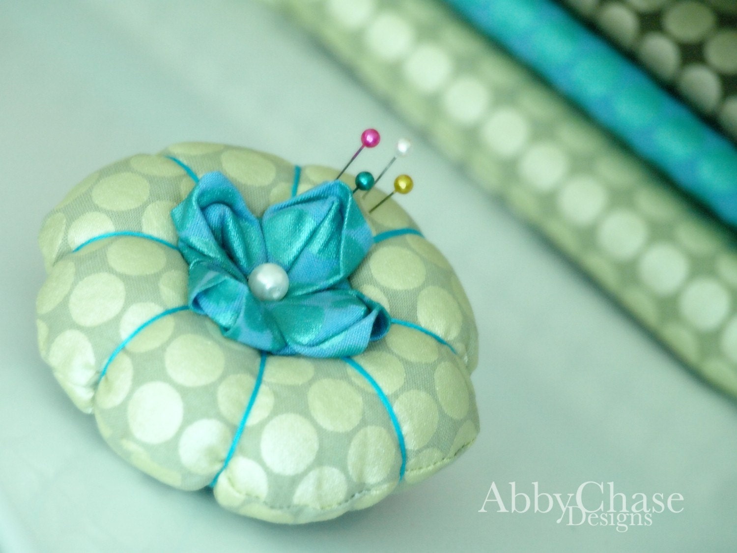 Lotus Blossom Pin Pillow............ by AbbyChase Designs......... The newest in the pincushion line