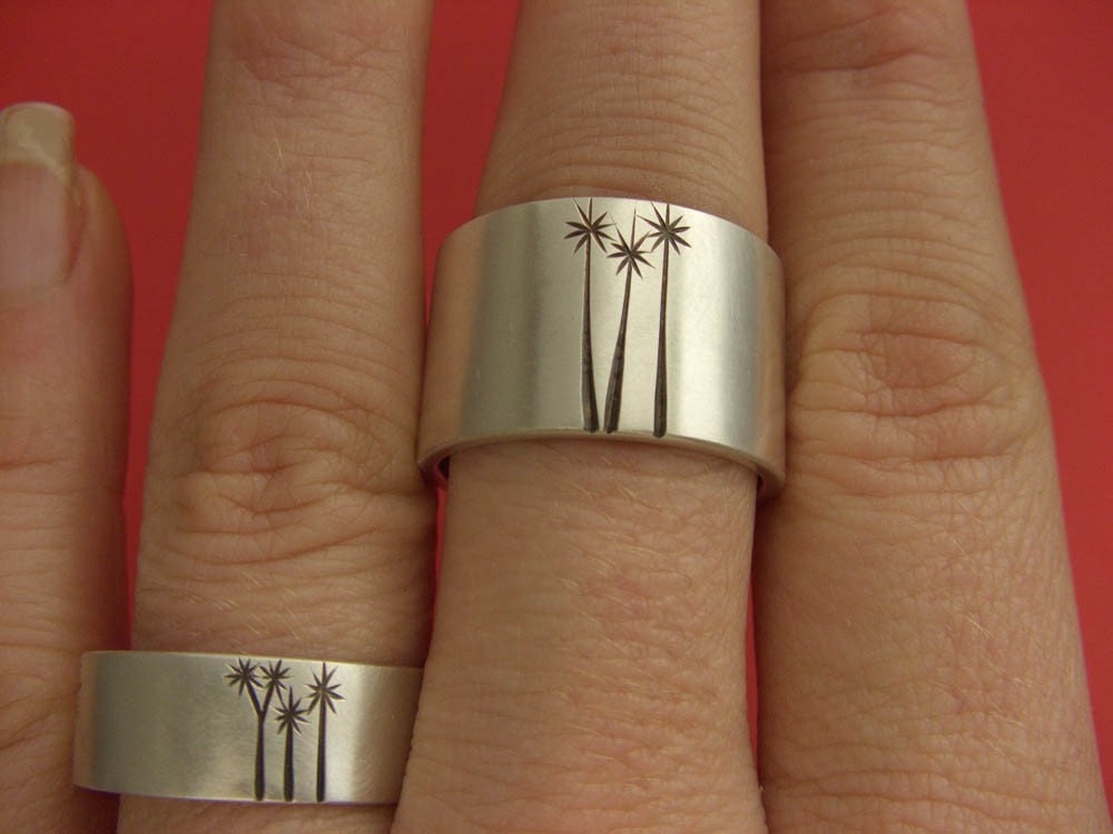 See his entire collection of handmade wedding bands here