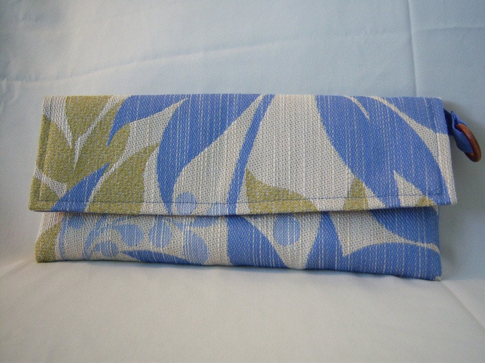 blue green tropical print clutch tapestry