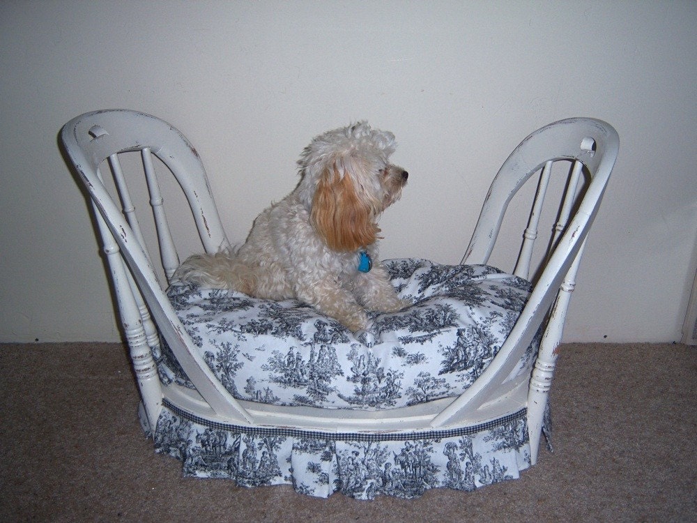 Shabby chic dog bed with toile pad.