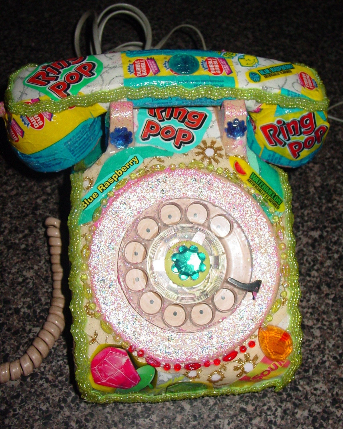recycled vintage dial phone by C.Reinke RING POP candy wrappers.Kitsch at its best