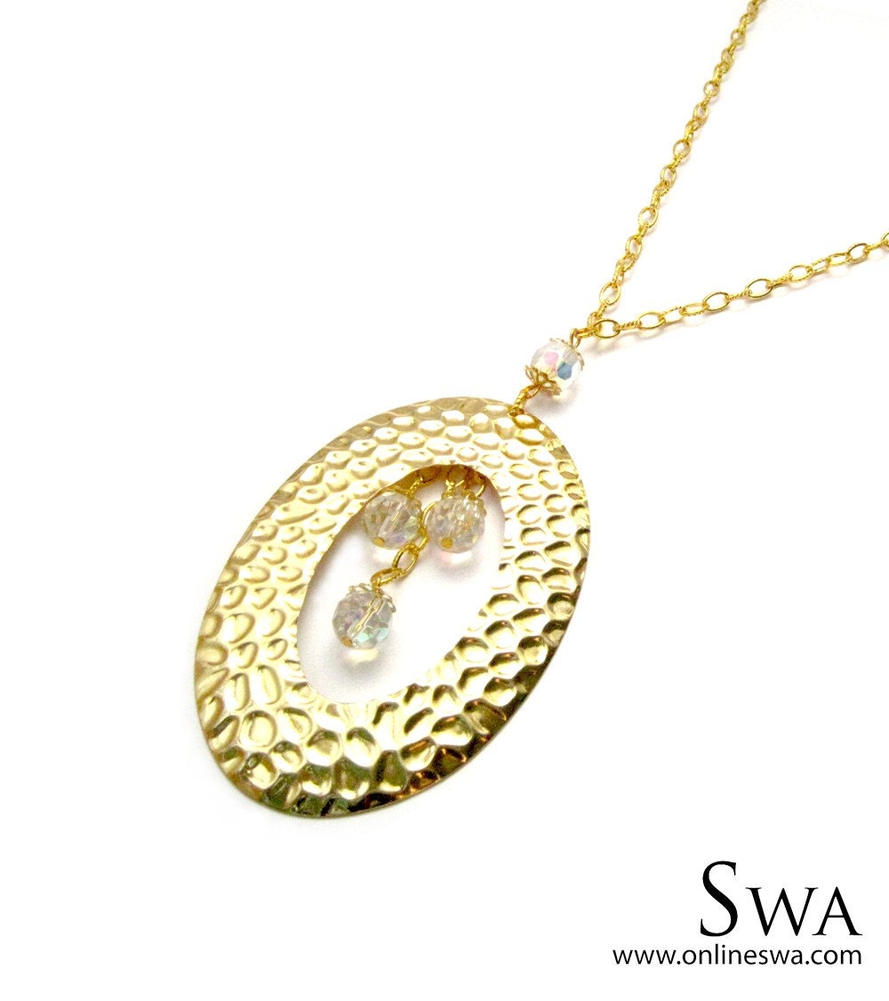 Big textured Gold Pendant with faceted glass beads