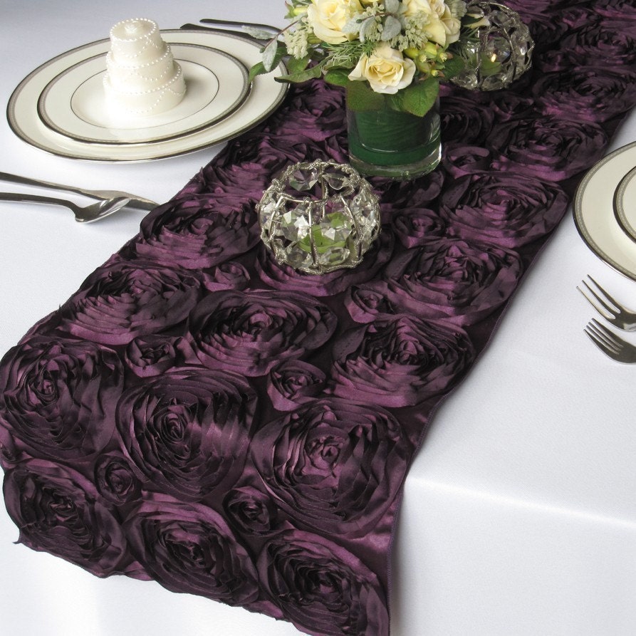 A stunning and unique dark purple rosette table runner.