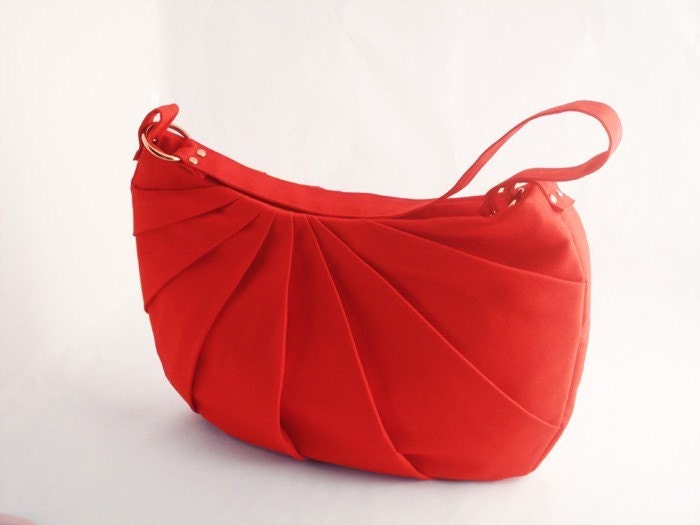 The Petal Shoulder Bag in candy apple red