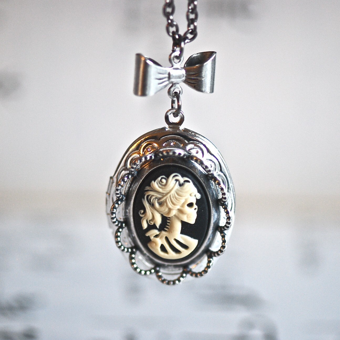 SALE - Miss Skeleton locket with bow tie necklace - Ivory Black Lolita Zombie Girl Cameo - SILVER LOCKET - gunmetal chain