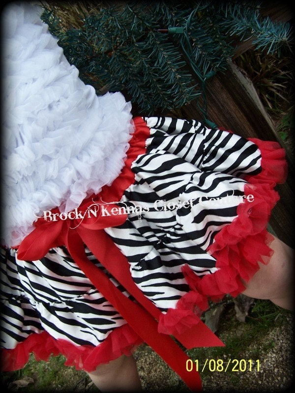 Are you looking for a special Valentines day pettiskirt for lil valentine...Here is a fabulous red and zebra pettiskirt and it comes with 2 free matching bow...