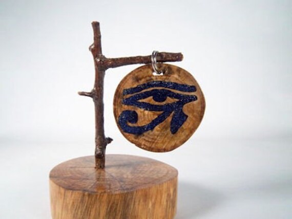 eye of horus amulet. Elm Wood Stone Inlay Eye of Horus Amulet. From whispwood