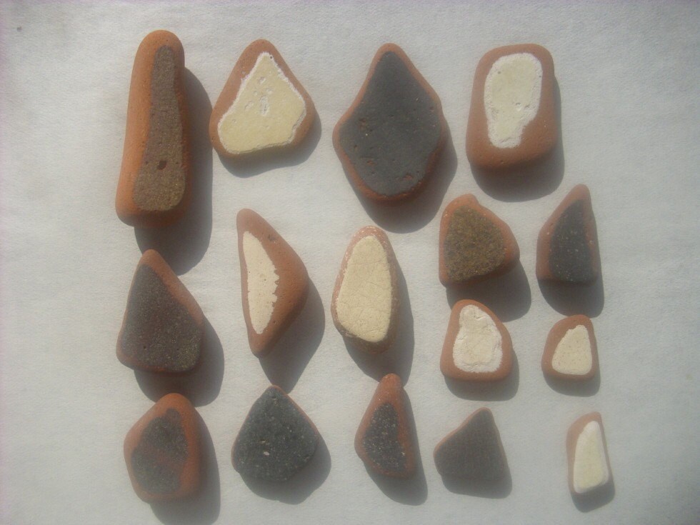 16  pieces of terracotta beach pottery  2698