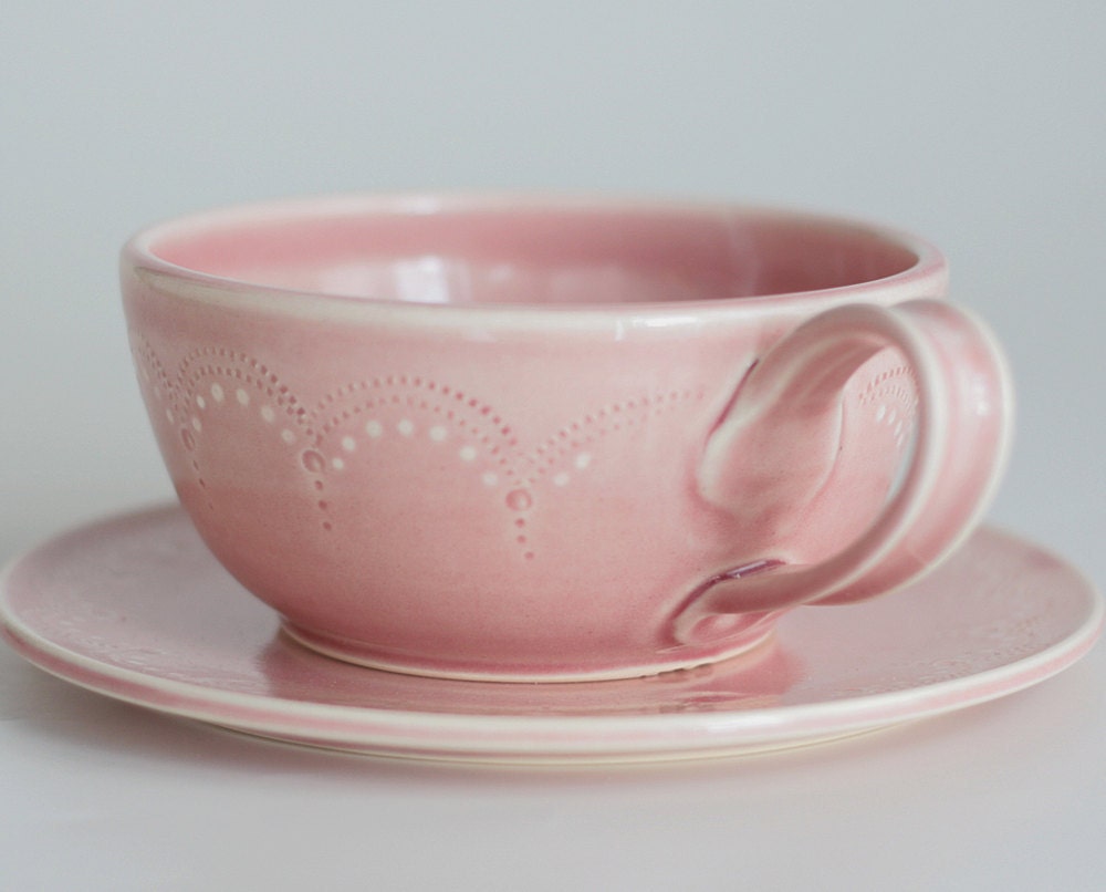 Oversized teacup and saucer set... scallop stitching in pink.