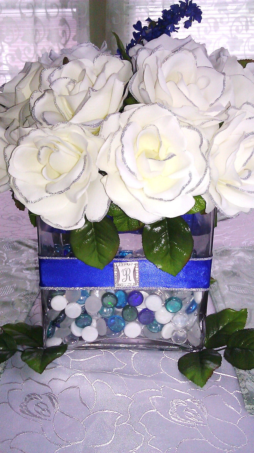 Custom Ivory Rose with Blue Ribbon and silver trimmings Glass Vase Centerpiece