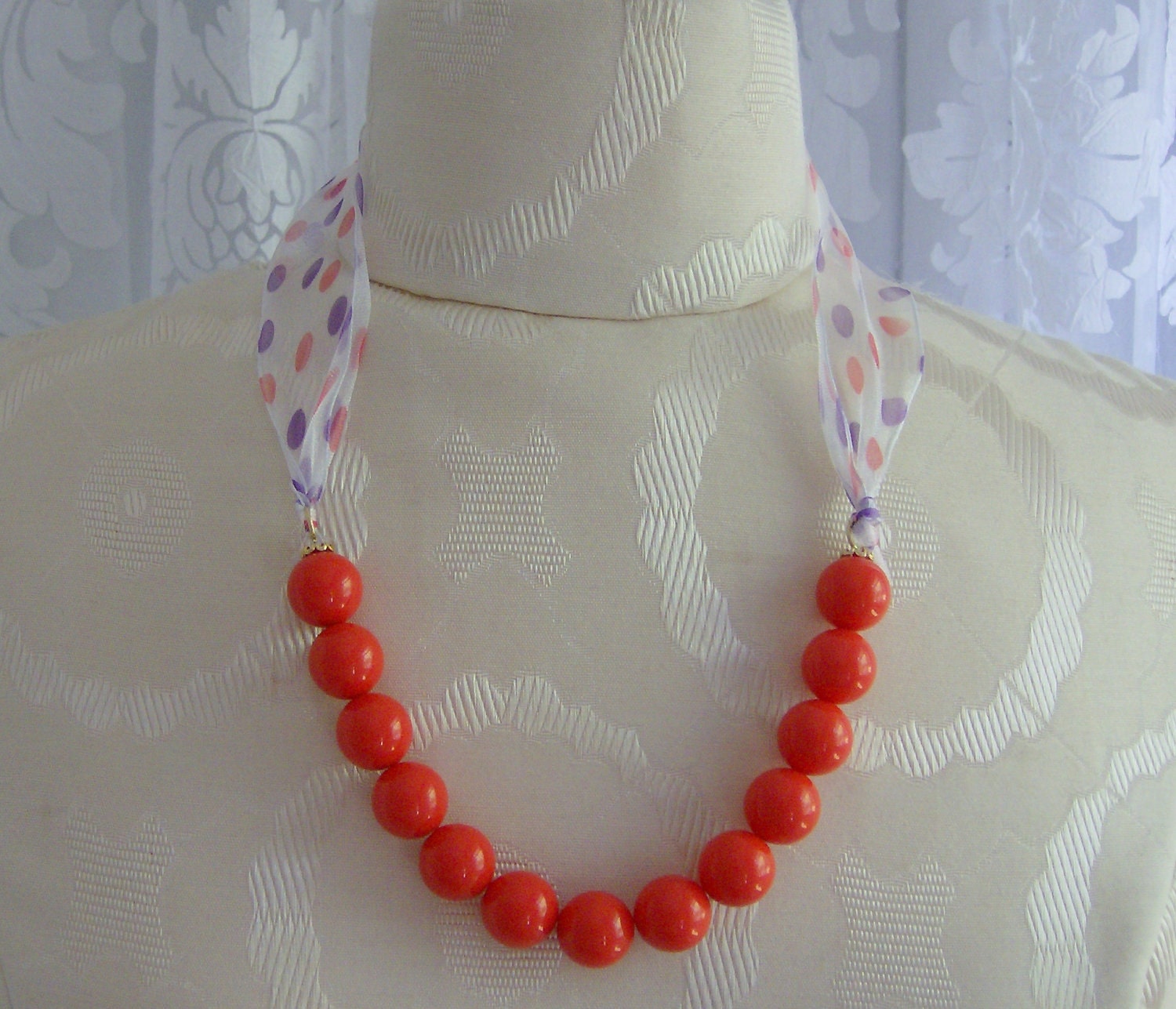 Orange coral polka dot ribbon necklace