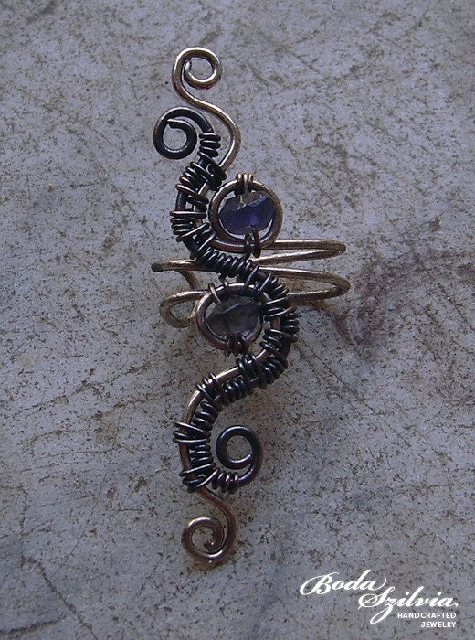 Silver,
                                    copper and iolite wire wrapped ear cuff