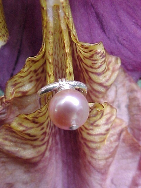 pink Lotus Clip no pierce clitoral hood ring. From AmberRainDesigns