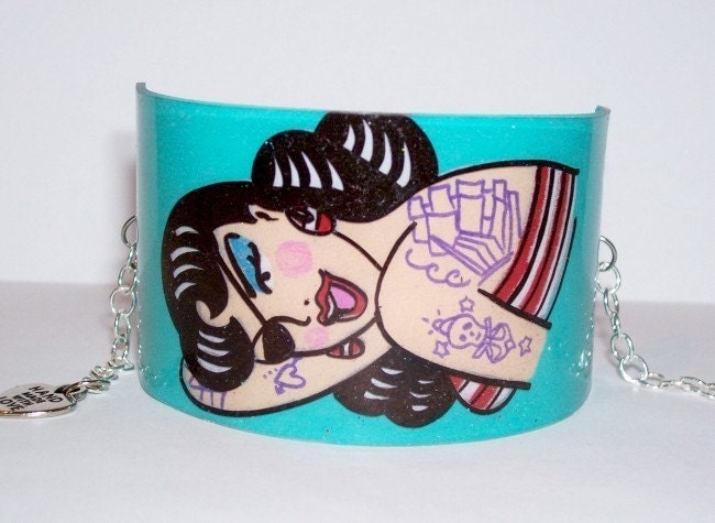 cuff bracelet tattoo. girl tattoo cuff bracelet