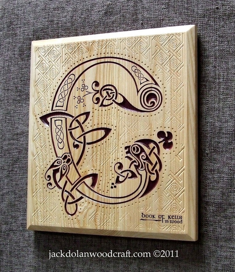 book of kells letters. Book of Kells in Wood - wall