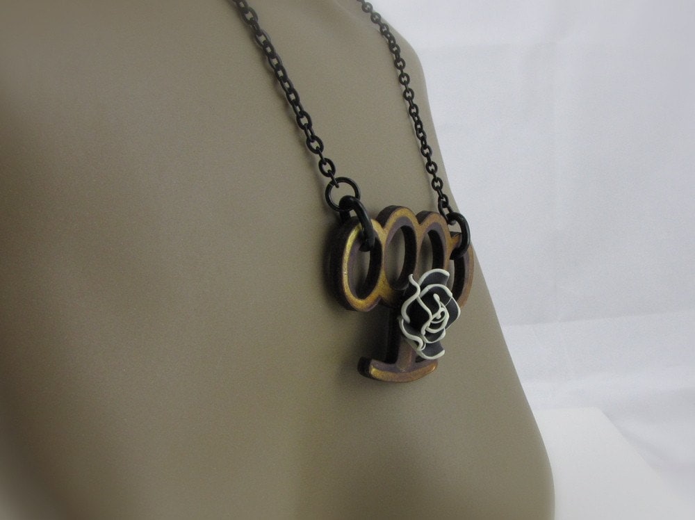 BRASS KNUCKLES NECKLACE THIS SUPER 