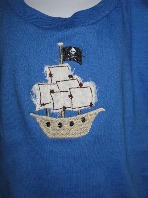 The pirate ship has appliqued sails 