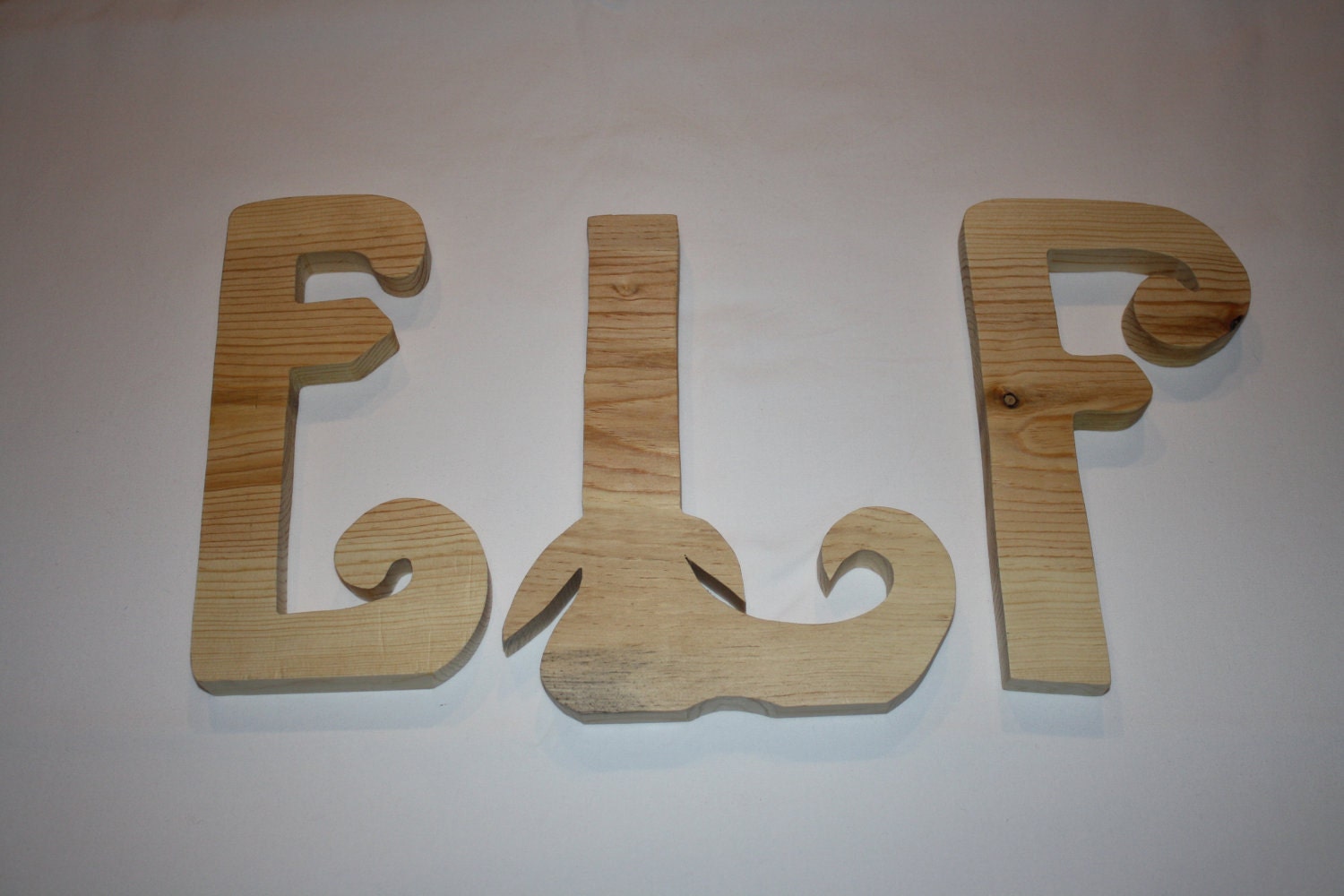 ELF unfinished wood letters sure to get you into the Christmas spirit