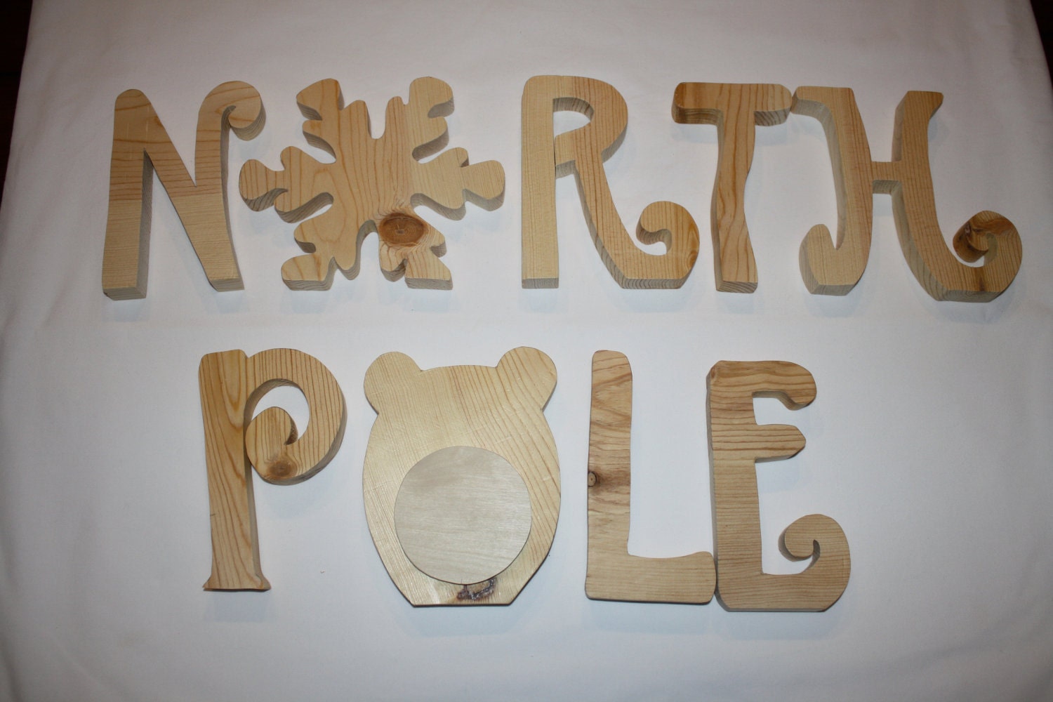 North Pole unfinished wood word to decorate you home for the season
