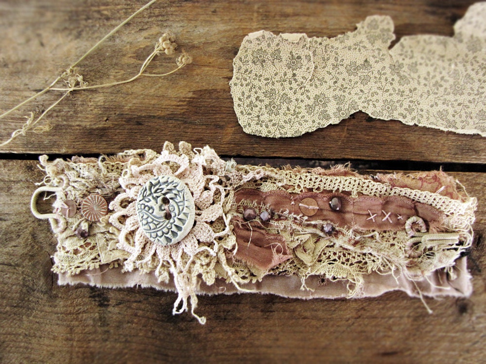 Dust of ages - salvage textile wristcuff - vintage lace - ceramic button detail