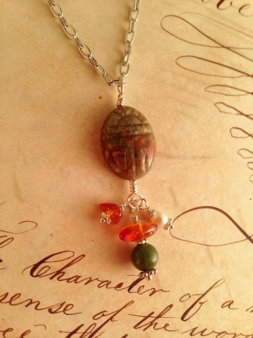 Carved scarab pendant necklace with amber, unakite, pearl and jade beads
