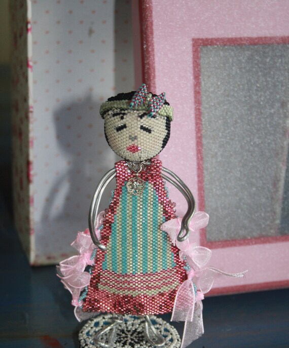 Sharon - a girl in a pink flowers and blue stripes dress with pink ribbons - OOAK home decor shabby art doll. pink and blue. beadwork.