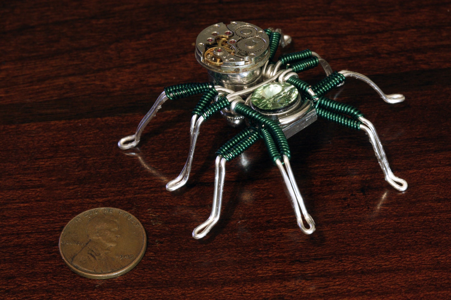 Steampunk Spider Lapel pin Sculpture with Chrysolite Swarovski Crystal and Antique Watch movement